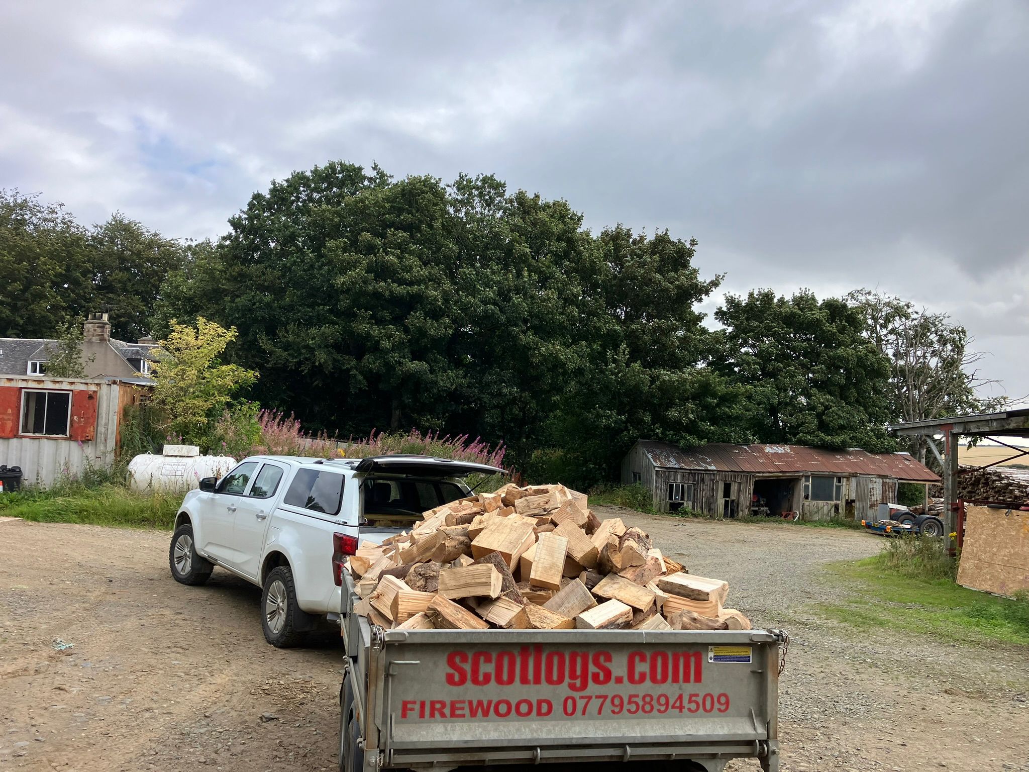RJS Scotlogs delivery vehicle with loaded trailer